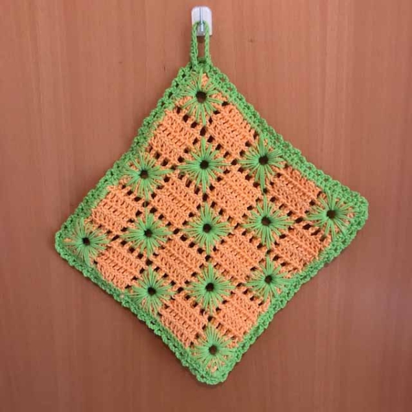Topflappen mit aufgestickten Sternen